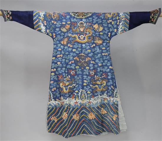 A Chinese blue satin embroidered silk and metal thread dragon robe, Jifu, late 19th / early 20th century,